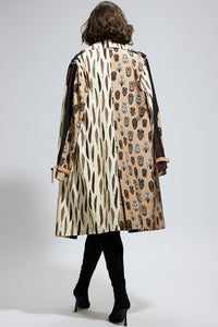 Mask and Feather Print Trench Coat