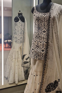 Ivory Strappy Short Kurti Paired With Gharara & Dupatta