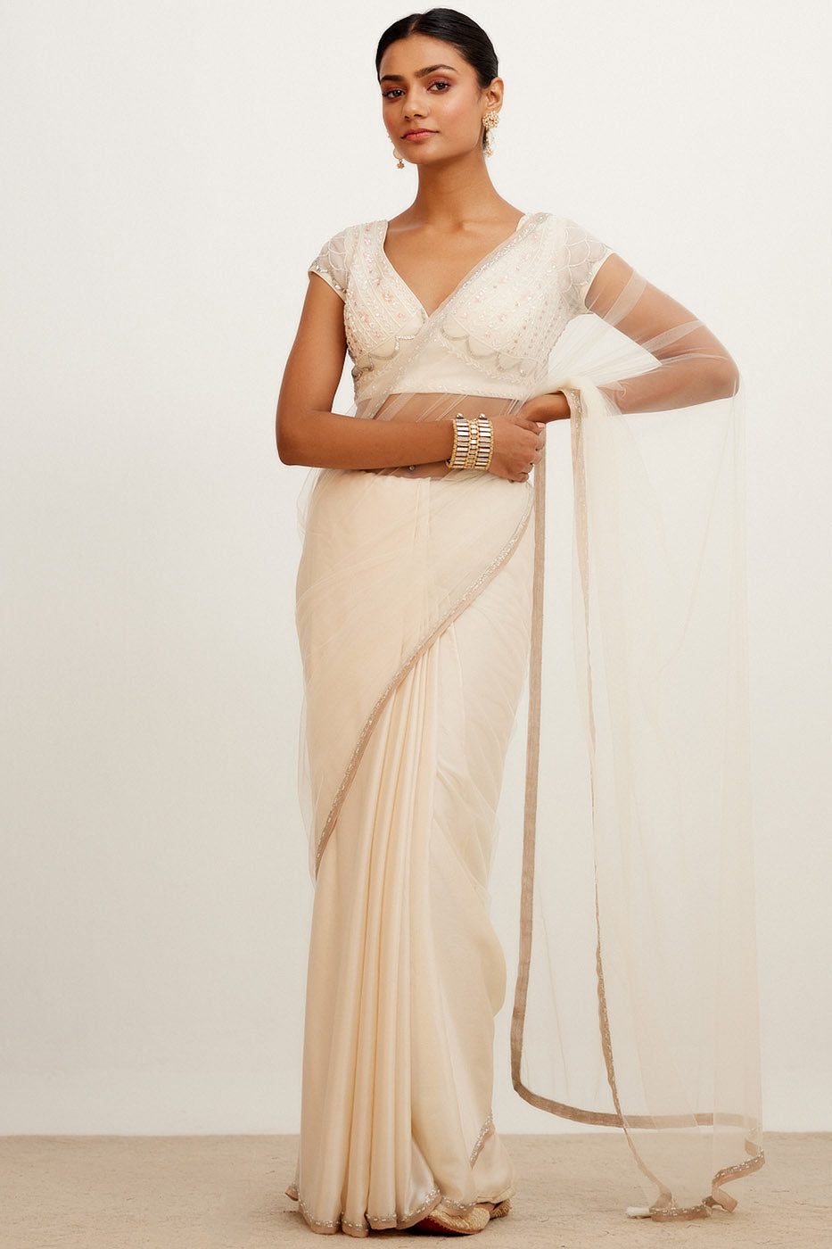 Ivory Embroidered Net and Satin Saree