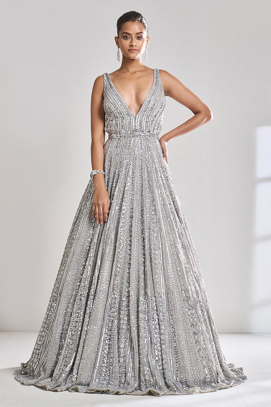 https://livethecollective.ca/cdn/shop/products/SilverSequinGown-01_900x.jpg?v=1671747967